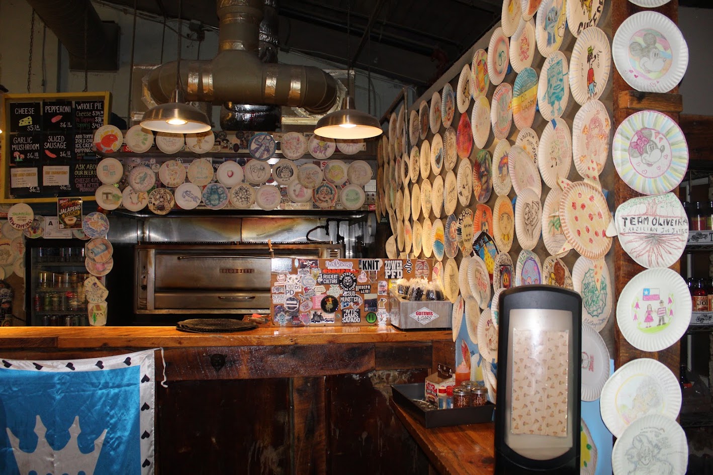 Pizza oven and serving counter inside Benny Pennello's in NoDa Charlotte