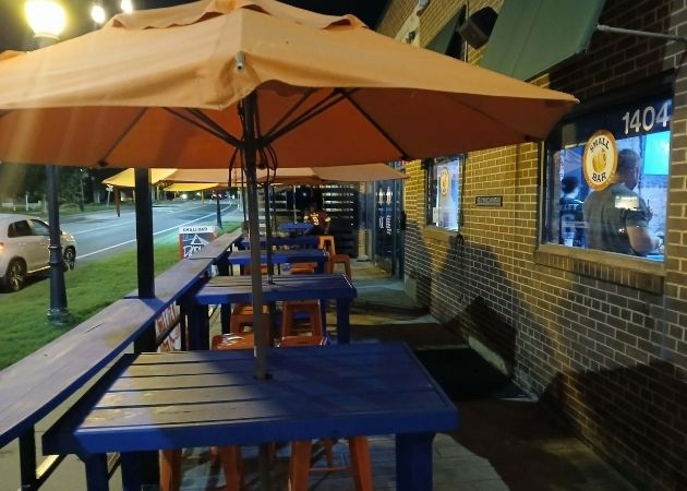 Outdoor seating at Small Bar Morehead in Charlotte