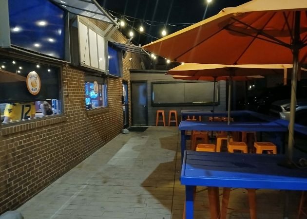 Side outdoor area at Small Bar Morehead