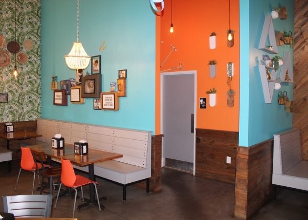 Corner seating area inside Tacos 4 Life Charlotte Steele Creek