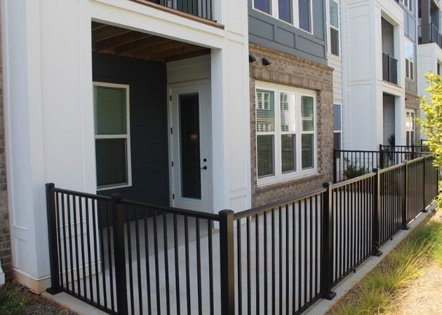 Ground-floor apartment patio at Bask Apartments in Steele Creek Charlotte