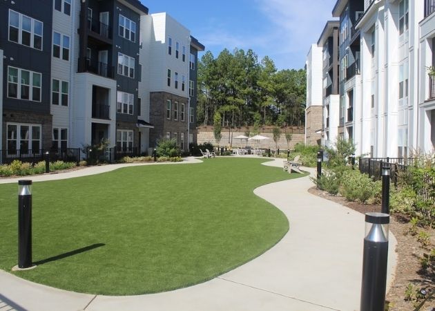 Outdoor lawn and green space at Bask Apartments in Steele Creek Charlotte