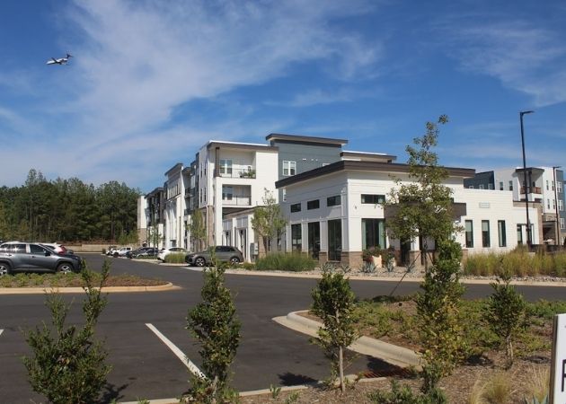 Outdoor parking area at Bask Apartments in Steele Creek Charlotte