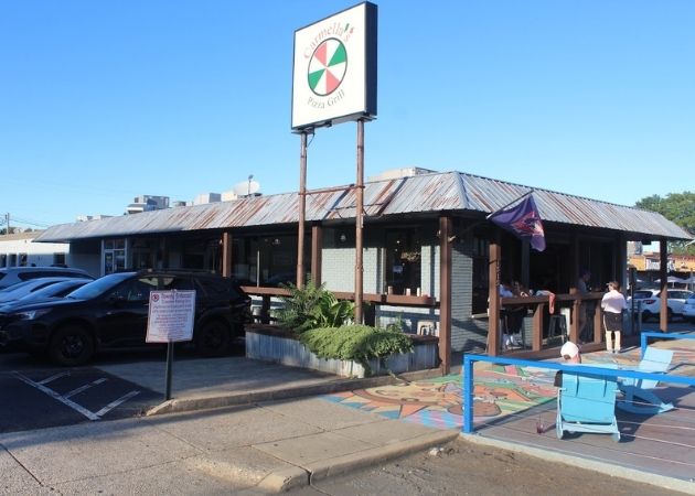 Outside Carmella's Pizza Grill on Montford Drive