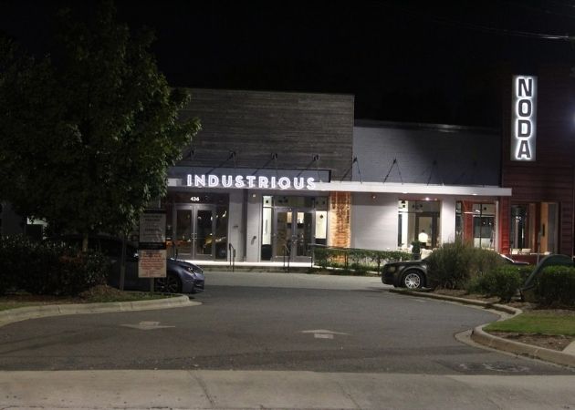 Industrious NoDa building and illuminated exterior at night in Charlotte