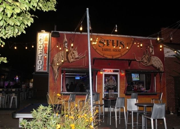 Stu's Barrel House and rooftop bar exterior at night in NoDa Charlotte