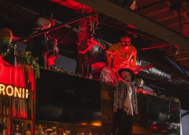 Music-themed skeleton Halloween decoration at VINYL
